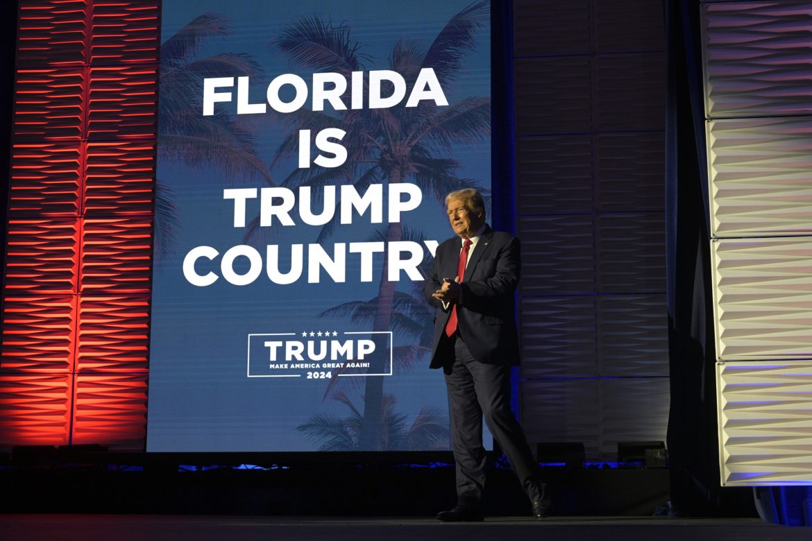 Former President Donald Trump stands on stage at the Republican Party of Florida Freedom Summit on Nov. 4, 2023, in Kissimmee. 