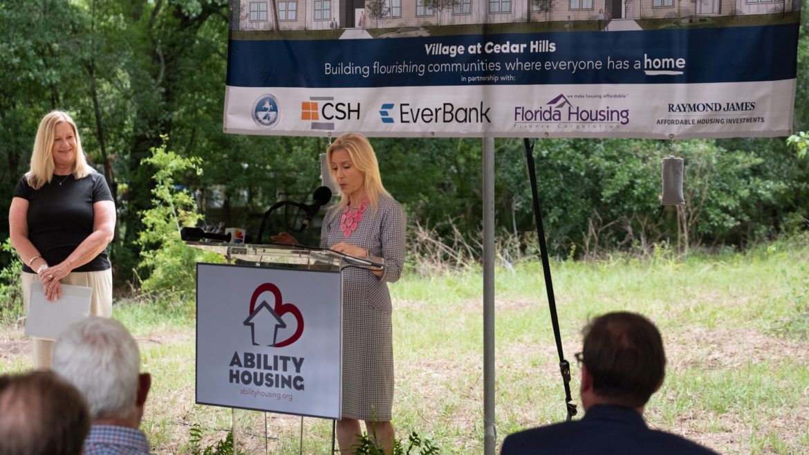Mayor Donna Deegan speaks at a groundbreaking Monday, May 13, 2024, for the Village at Cedar Hills. At left is Shannon Nazworth, president and CEO of Ability Housing. 