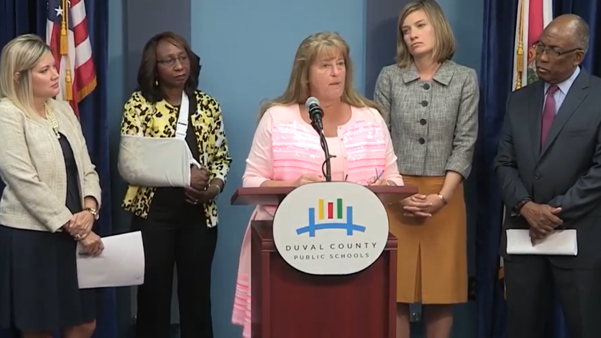Duval Teachers United President Teresa Brady speaking with School Board members in 2017.