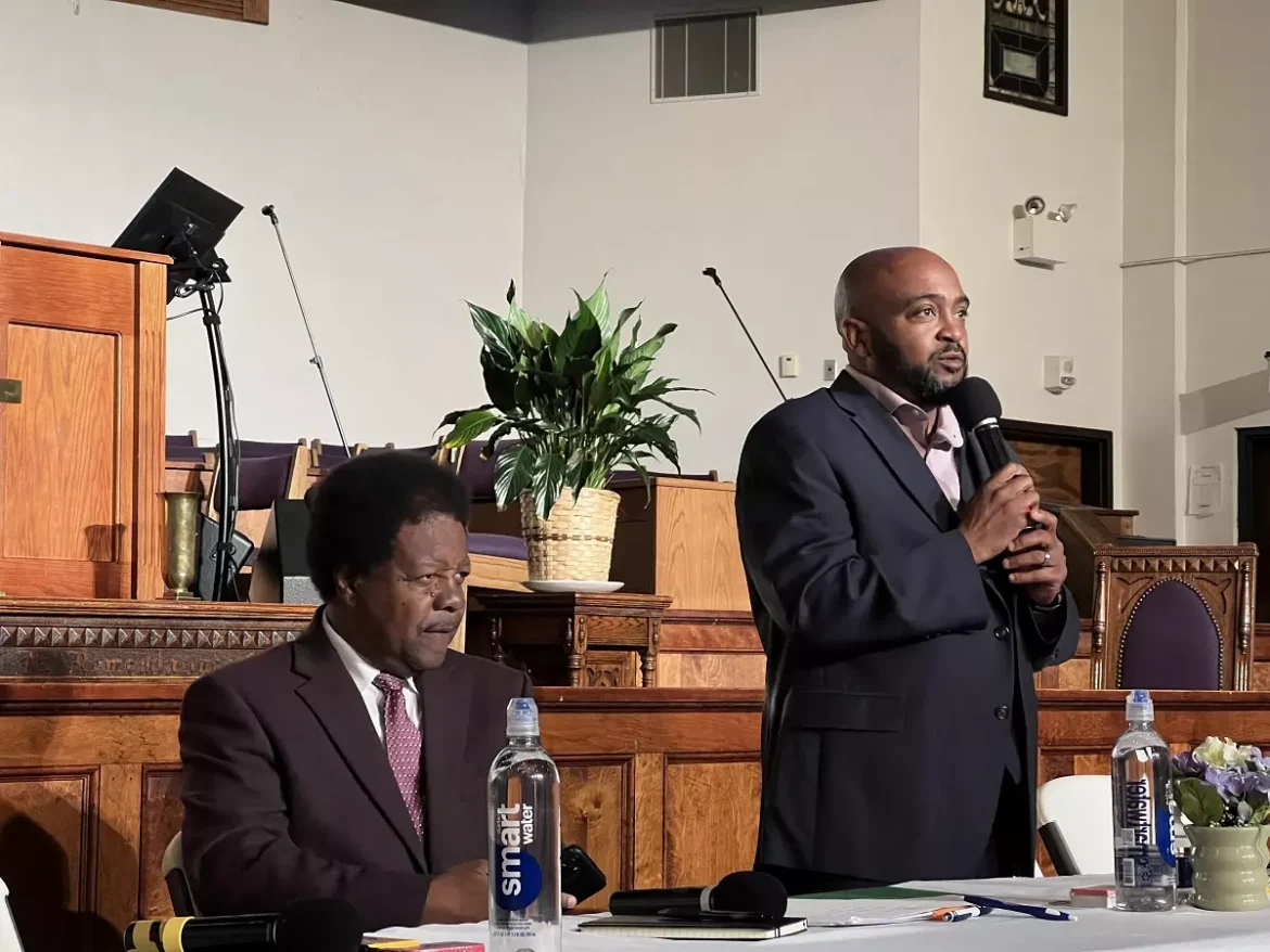 Leon County Commissioner Bill Proctor and Bethel AME Pastor Michael Price