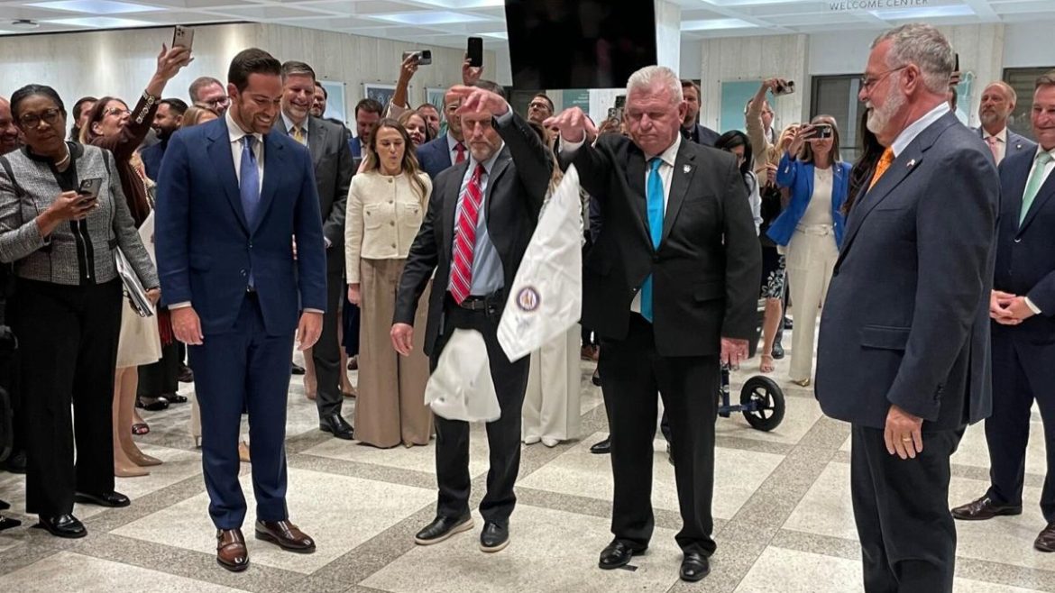 Hanky drop signifying the end of the legislative session.