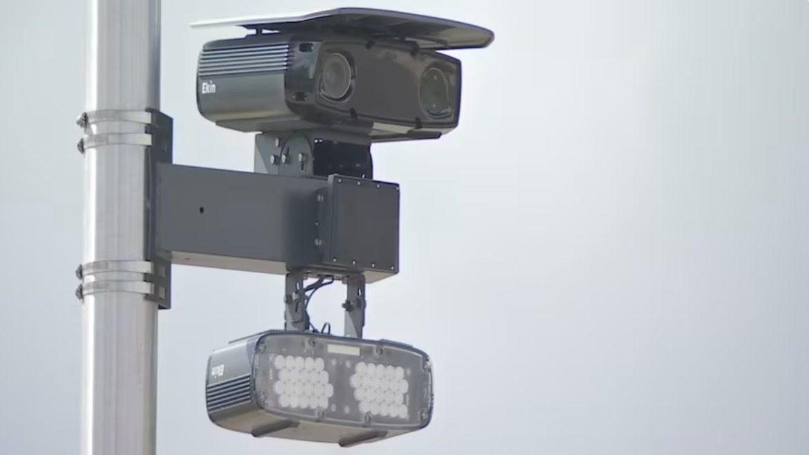 A red-light camera on a pole in Orange Park