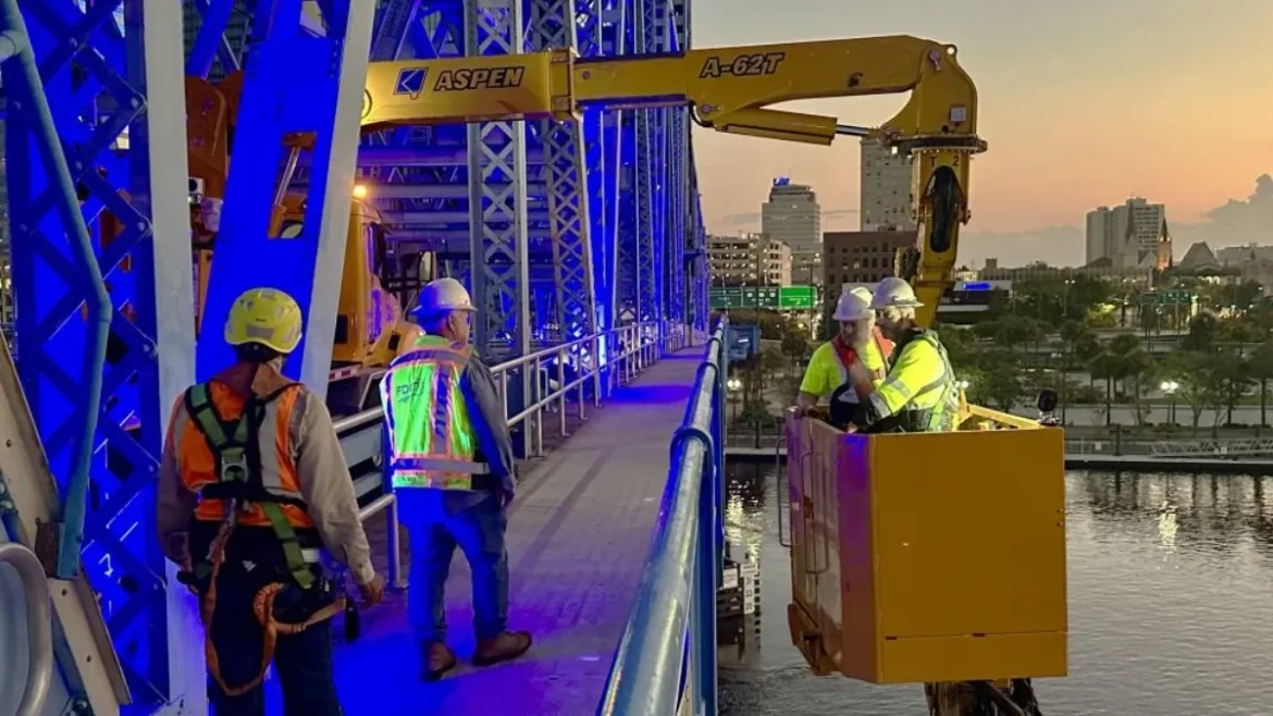 FDOT workers make repairs to the Main Street Bridge